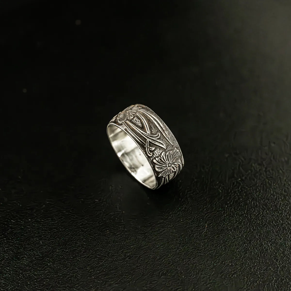 art deco style flower and leaf wide stacking ring made from sterling silver.
