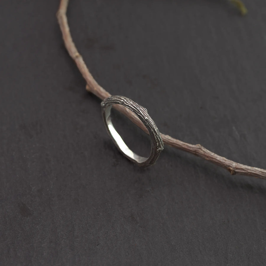Branch ring with the actual branch it was molded after next to it