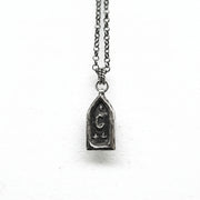 Sterling silver triple star and moon celestial pendant necklace for stargazers. The pendant sits on a rolo style chain